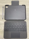 Combo-logitech Folio Touch Keyboard Case (graphite) & Crayon (mid Gray) Used. Price: $130.00.